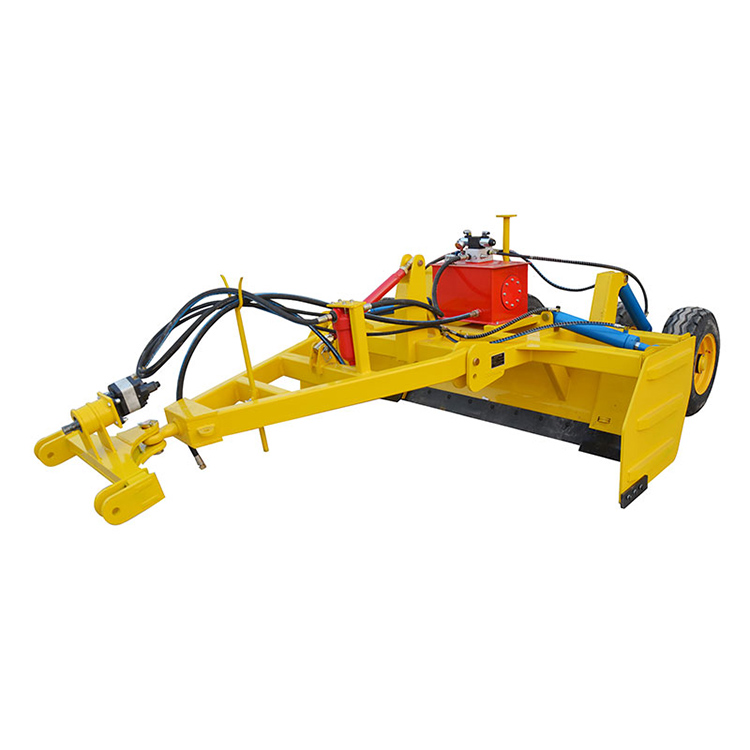 Traktor paigaldas maa tasandajad